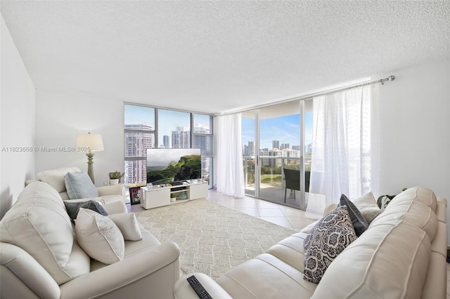 3731 N Country Club Dr Unit 2023, Aventura, FL 33180 - living room with a textured ceiling, tile patterned flooring, and a wall of windows