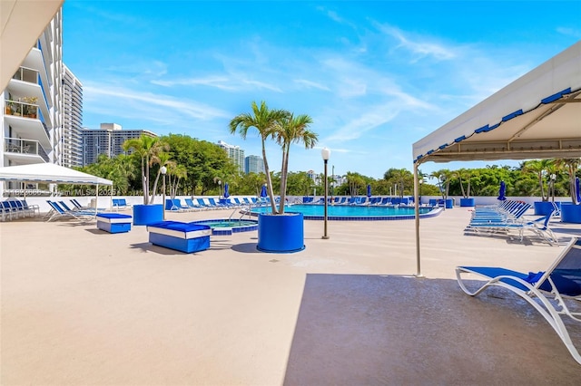 3731 N Country Club Dr Unit 2023, Aventura, FL 33180 - community pool with a patio and a community hot tub