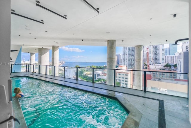 398 NE 5th St Unit 2407, Miami, FL 33132 - indoor pool with a view of city and a water view