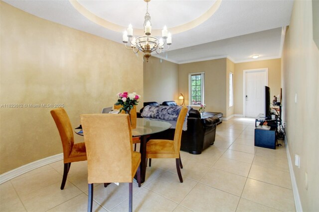 21025 NE 31st Ave, Aventura, FL 33180 - dining area featuring a chandelier, ornamental molding, and light tile patterned flooring