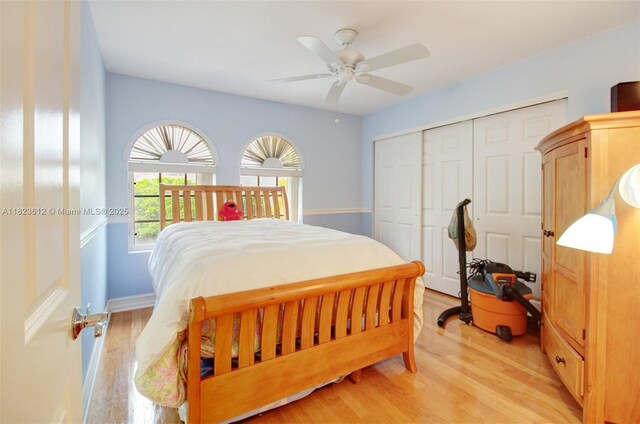 21025 NE 31st Ave, Aventura, FL 33180 - bedroom featuring light wood finished floors, a closet, and ceiling fan