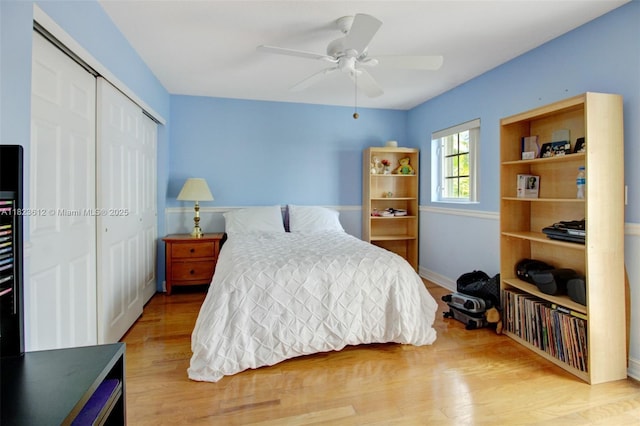 21025 NE 31st Ave, Aventura, FL 33180 - bedroom with a closet, wood finished floors, and ceiling fan