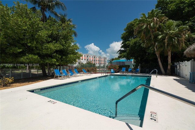 95 Coco Plum Dr Unit 1A, Marathon, FL 33050 - community pool with a patio