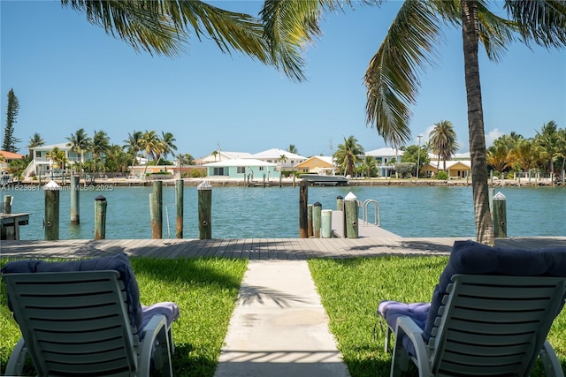 95 Coco Plum Dr Unit 1A, Marathon, FL 33050 - water view featuring a dock and nearby suburban area