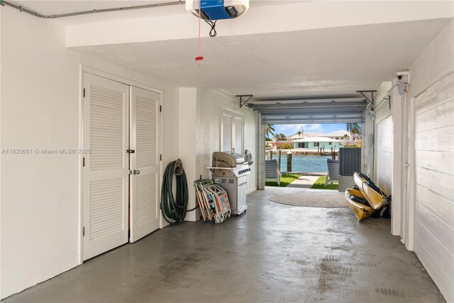 95 Coco Plum Dr Unit 1A, Marathon, FL 33050 - garage featuring a garage door opener