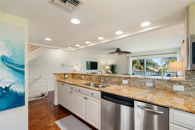 95 Coco Plum Dr Unit 1A, Marathon, FL 33050 - kitchen with dishwasher, dark wood-style floors, white cabinets, light stone counters, and recessed lighting