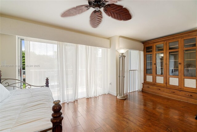 95 Coco Plum Dr Unit 1A, Marathon, FL 33050 - bedroom with wood finished floors and ceiling fan
