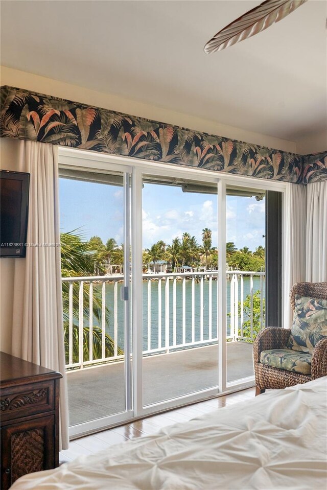 95 Coco Plum Dr Unit 1A, Marathon, FL 33050 - bedroom with access to exterior and a water view