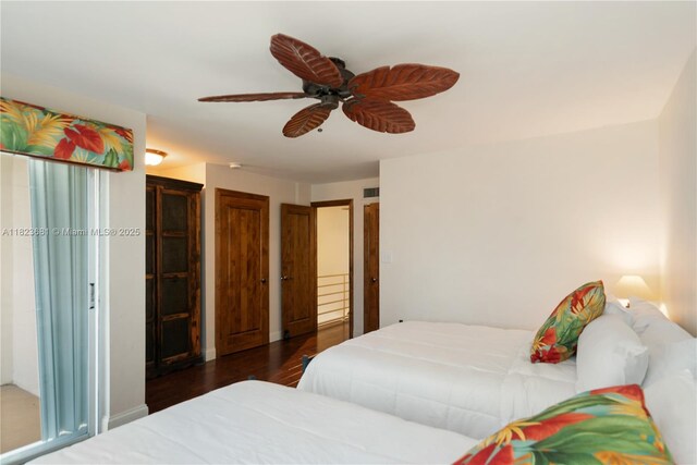 95 Coco Plum Dr Unit 1A, Marathon, FL 33050 - bedroom featuring wood finished floors and ceiling fan