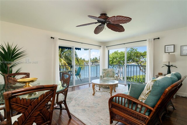 95 Coco Plum Dr Unit 1A, Marathon, FL 33050 - sunroom / solarium with wood finished floors and a water view