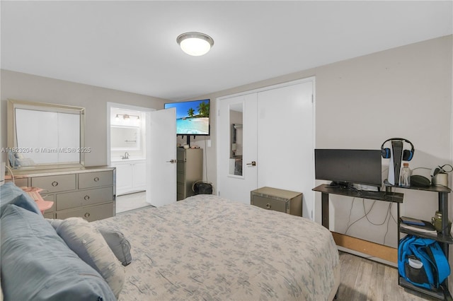 117 Ronald Rd, West Park, FL 33023 - bedroom with light wood-style flooring and a sink