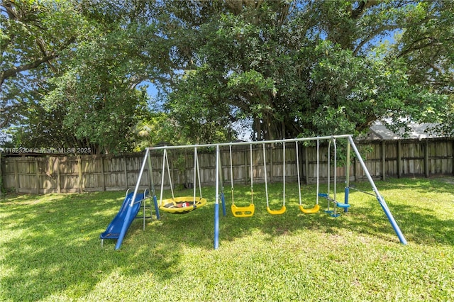 117 Ronald Rd, West Park, FL 33023 - view of play area with a fenced backyard