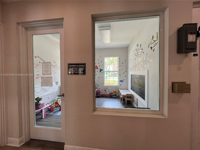 14745 SW 9th St Unit 3109, Pembroke Pines, FL 33027 - hall featuring baseboards and wood finished floors