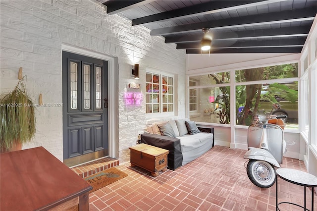 842 NW 9th Ct, Miami, FL 33136 - sunroom / solarium with brick floors and a wood ceiling with exposed beams
