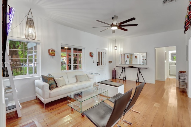842 NW 9th Ct, Miami, FL 33136 - living area with ceiling fan and wood-type flooring