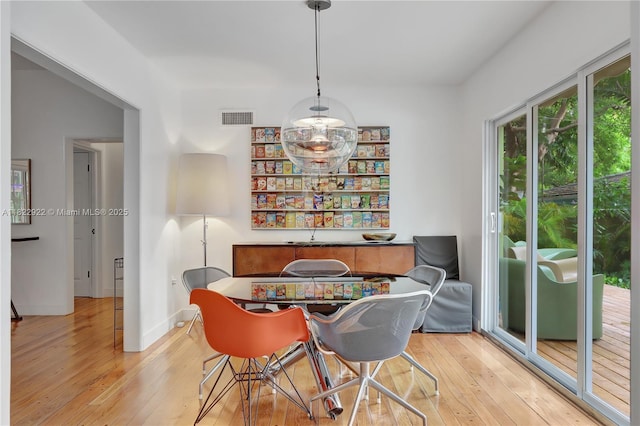 842 NW 9th Ct, Miami, FL 33136 - dining area featuring wood-type flooring