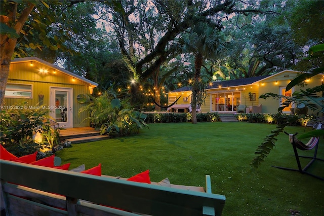 842 NW 9th Ct, Miami, FL 33136 - view of green lawn featuring a wooden deck