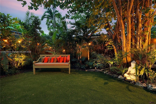 842 NW 9th Ct, Miami, FL 33136 - yard at dusk with a lawn