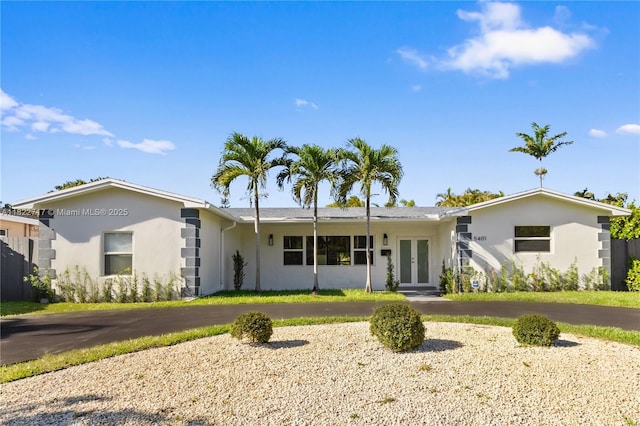 5401 Fillmore St, Hollywood, FL 33021 - ranch-style home with french doors and stucco siding