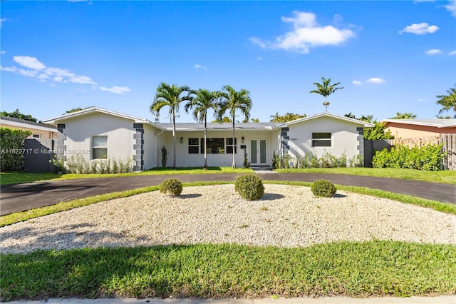 5401 Fillmore St, Hollywood, FL 33021 - ranch-style home featuring french doors, stucco siding, and driveway
