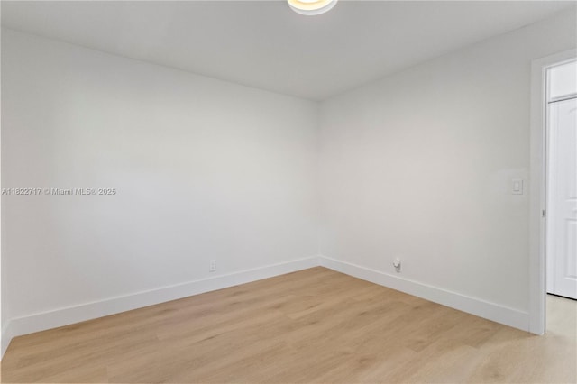 5401 Fillmore St, Hollywood, FL 33021 - empty room featuring baseboards and light wood finished floors