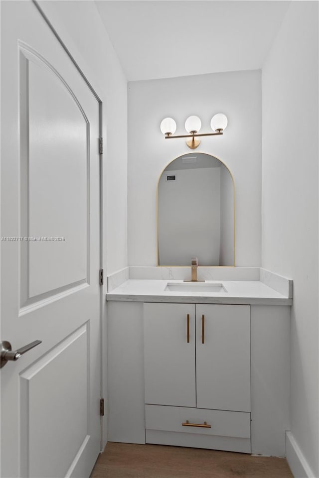 5401 Fillmore St, Hollywood, FL 33021 - bathroom featuring vanity and wood finished floors