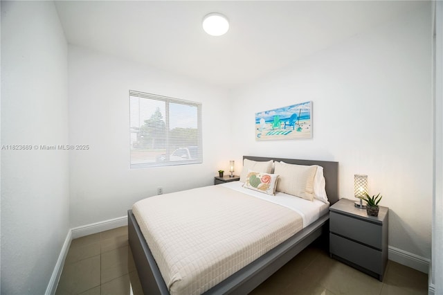 1250 NE 110th St, Miami, FL 33161 - bedroom with baseboards and tile patterned floors