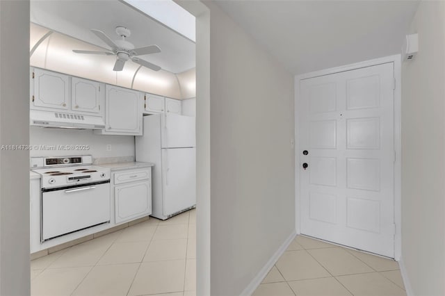 777 S Federal Hwy Unit 201G, Pompano Beach, FL 33062 - kitchen featuring white appliances, range hood, a ceiling fan, light countertops, and light tile patterned floors