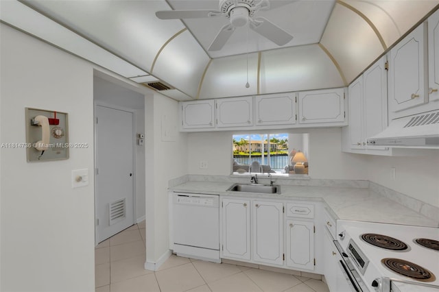 777 S Federal Hwy Unit 201G, Pompano Beach, FL 33062 - kitchen with white appliances, under cabinet range hood, light tile patterned floors, ceiling fan, and light countertops