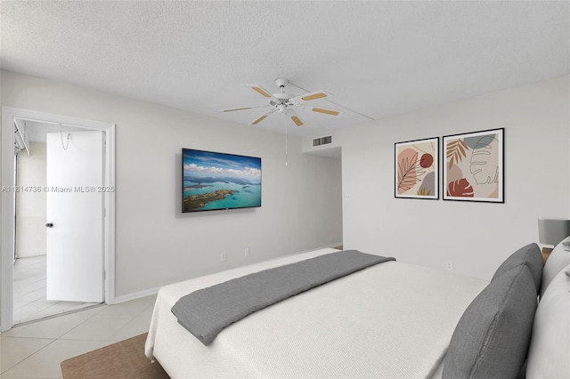 777 S Federal Hwy Unit 201G, Pompano Beach, FL 33062 - bedroom with light tile patterned floors, ceiling fan, and a textured ceiling