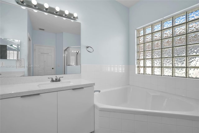 15452 SW 138th Ter, Miami, FL 33196 - full bath featuring a bath, vanity, and a stall shower
