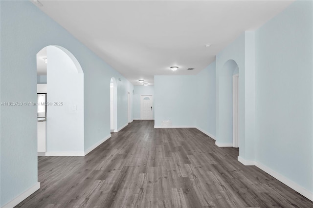 15452 SW 138th Ter, Miami, FL 33196 - empty room featuring wood finished floors and arched walkways