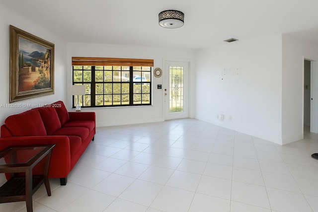 5348 W 14th Ave, Hialeah, FL 33012 - living area featuring baseboards