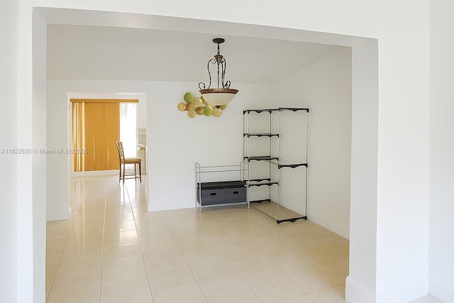5348 W 14th Ave, Hialeah, FL 33012 - empty room with baseboards and light tile patterned floors