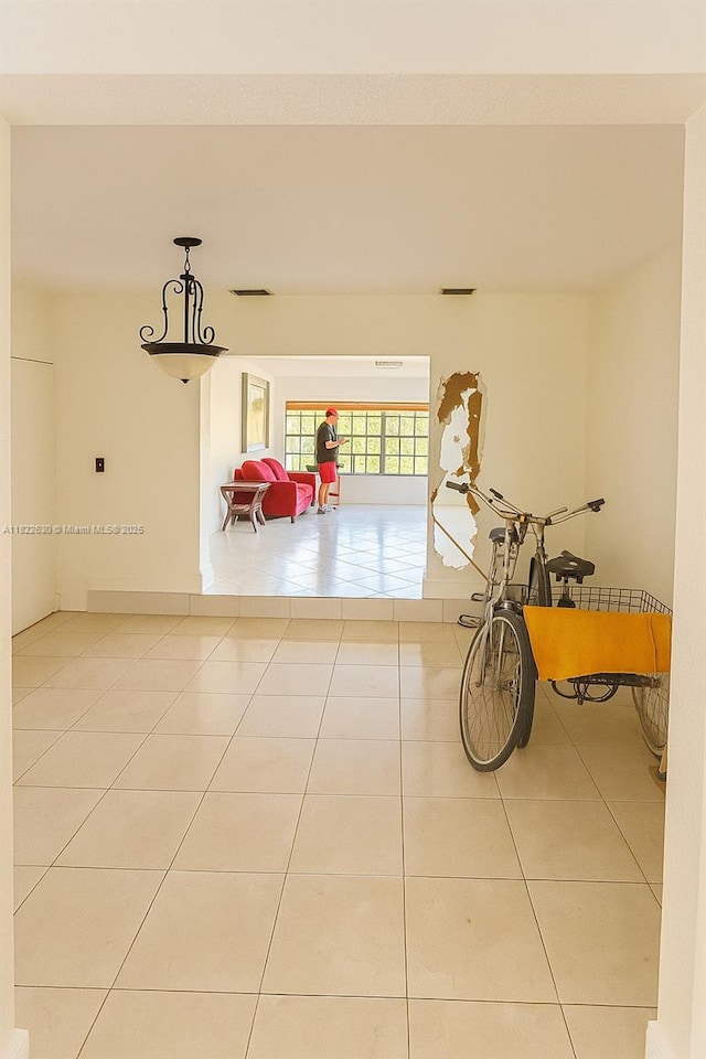 5348 W 14th Ave, Hialeah, FL 33012 - hall with tile patterned floors