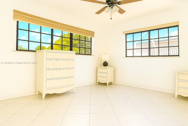 5348 W 14th Ave, Hialeah, FL 33012 - empty room featuring a ceiling fan and baseboards