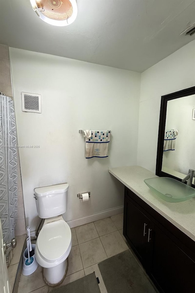 5348 W 14th Ave, Hialeah, FL 33012 - bathroom with vanity and tile patterned floors