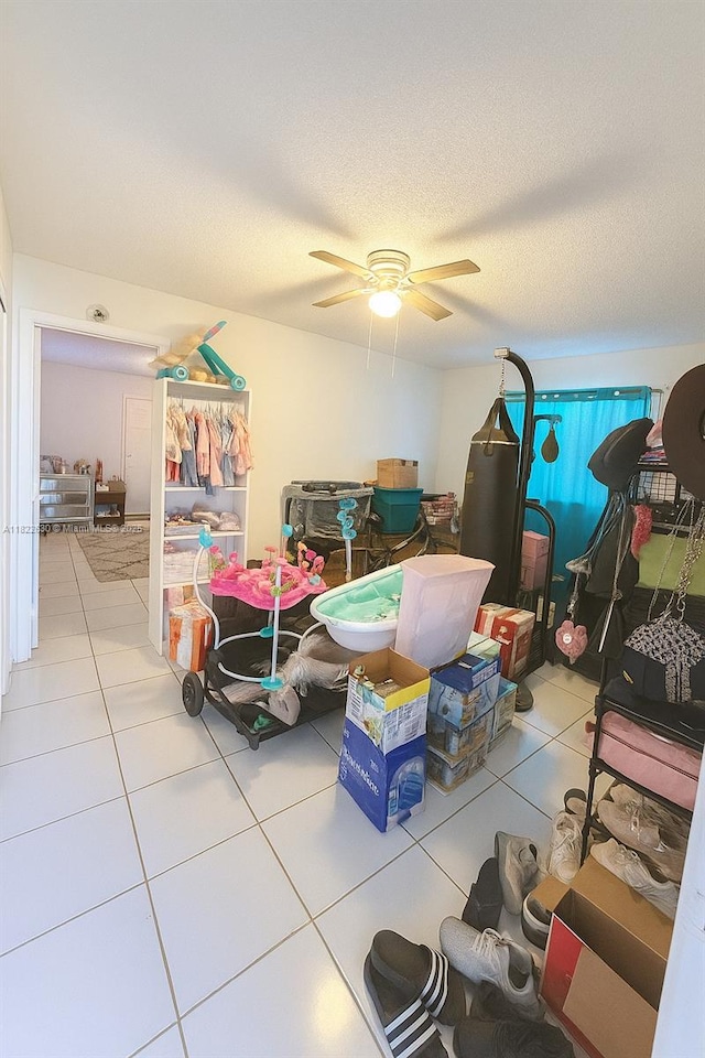 5348 W 14th Ave, Hialeah, FL 33012 - interior space with a ceiling fan and a textured ceiling