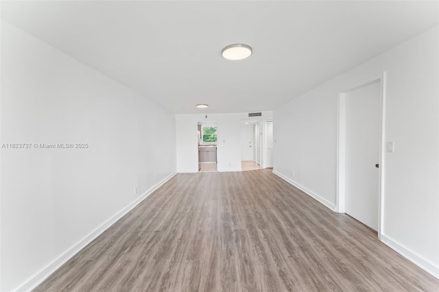5100 SW 64th Ave Unit 204A, Davie, FL 33314 - unfurnished room featuring wood finished floors and baseboards