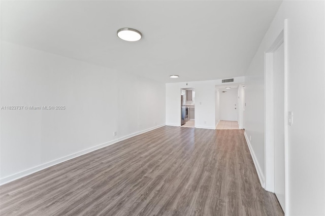 5100 SW 64th Ave Unit 204A, Davie, FL 33314 - unfurnished living room featuring wood finished floors