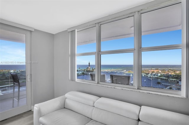 2639 N Riverside Dr Unit 1203, Pompano Beach, FL 33062 - living area featuring a water view and wood finished floors