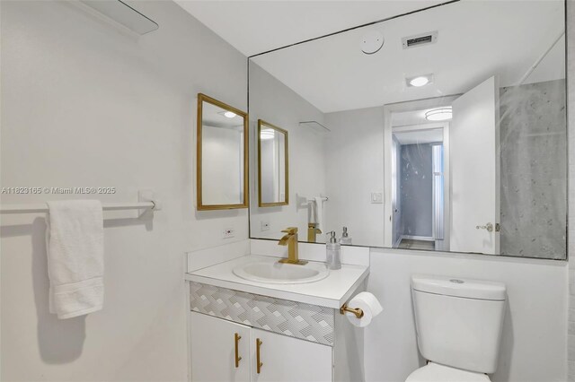 2639 N Riverside Dr Unit 1203, Pompano Beach, FL 33062 - bathroom with vanity and toilet