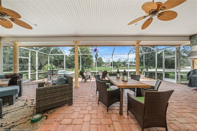 3859 Enchanted Oaks Ln, Sebring, FL 33875 - sunroom / solarium featuring ceiling fan and an outdoor hangout area