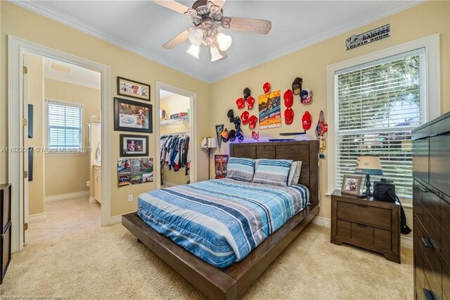 3859 Enchanted Oaks Ln, Sebring, FL 33875 - bedroom featuring light carpet, a spacious closet, crown molding, a closet, and ensuite bath
