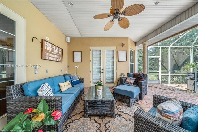 3859 Enchanted Oaks Ln, Sebring, FL 33875 - sunroom featuring a ceiling fan, an outdoor living space, and plenty of natural light
