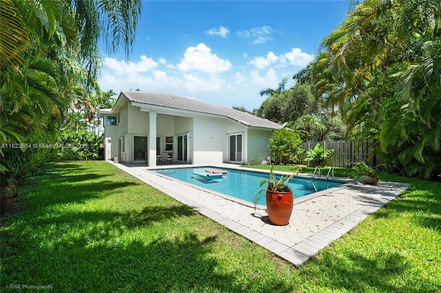 6670 SW 69th Ln, South Miami, FL 33143 - view of swimming pool with a patio area