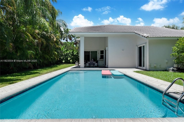 6670 SW 69th Ln, South Miami, FL 33143 - outdoor pool featuring a patio and a yard