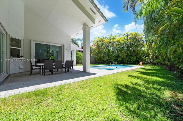 6670 SW 69th Ln, South Miami, FL 33143 - view of grassy yard featuring a patio area