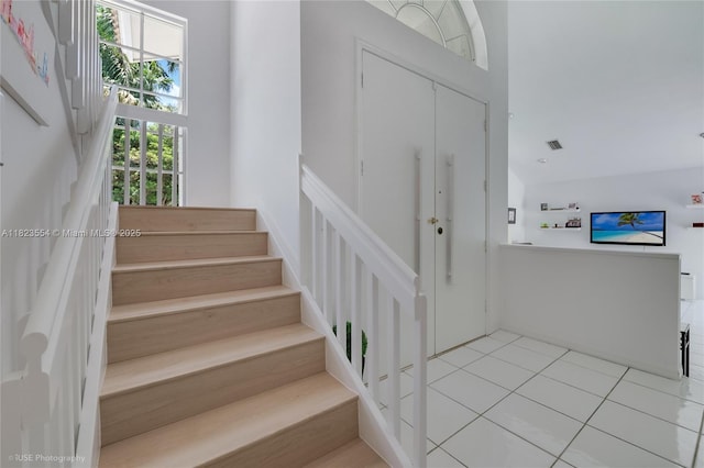 6670 SW 69th Ln, South Miami, FL 33143 - stairway with tile patterned floors