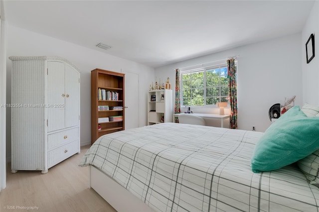 6670 SW 69th Ln, South Miami, FL 33143 - bedroom with wood finished floors
